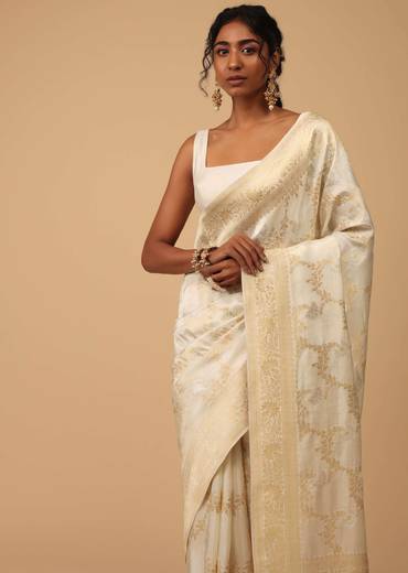 Ivory White Dola Silk Saree With Silver And Gold Jaal Embroidery In Floral Pattern