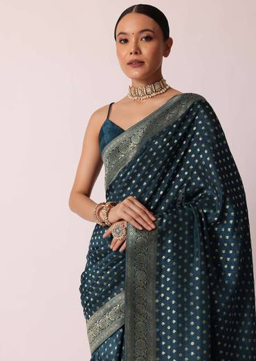 Teal Dola Silk Saree With Woven Zari Pallu And Unstitched Blouse Piece