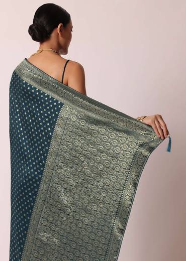 Teal Dola Silk Saree With Woven Zari Pallu And Unstitched Blouse Piece