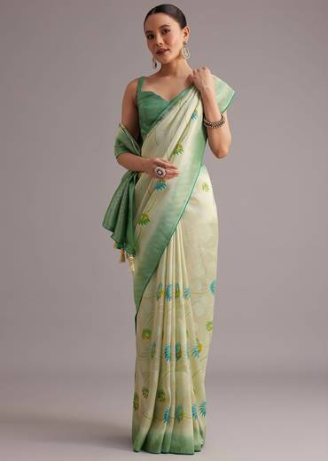 Sea Green Tissue Silk Floral Motif Saree With Contrast Pallu And Border