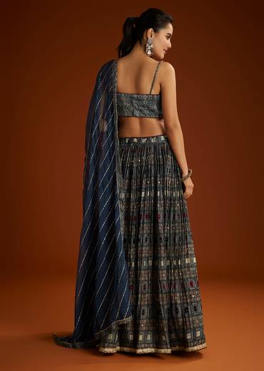 Artisan Couple Set – Indigo Modal Bridesmaid Lehenga With Ajrakh Print For Her And Blue Mirror Work Jacket Set For Him