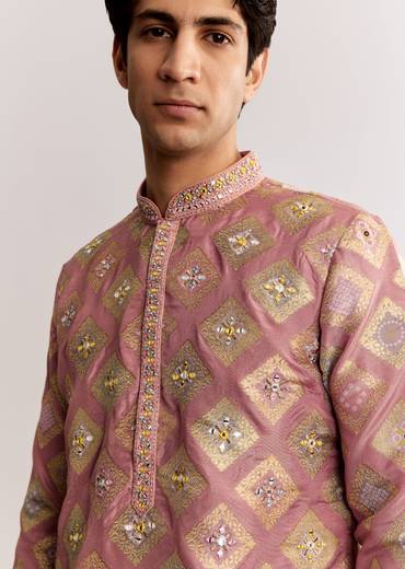 Elegant Couple Set – Light Pink Banarasi Silk Lehenga Set with Embroidered Choli for Her And Pink Silk Kurta Set with Mirror Geometric Print for Him
