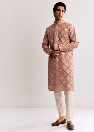Elegant Couple Set – Light Pink Banarasi Silk Lehenga Set with Embroidered Choli for Her And Pink Silk Kurta Set with Mirror Geometric Print for Him