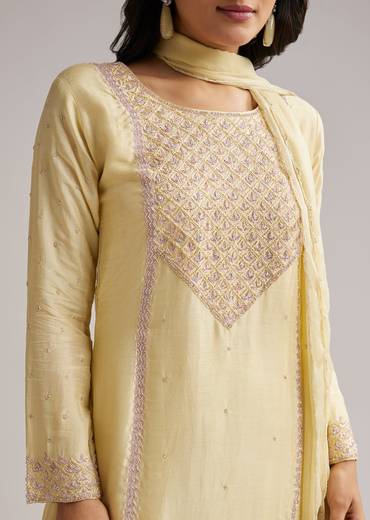 Pastel Yellow Celebration Edit – Embroidered Sharara Set For Her And Pastel Yellow Silk Mirror Work Kurta Set For Him