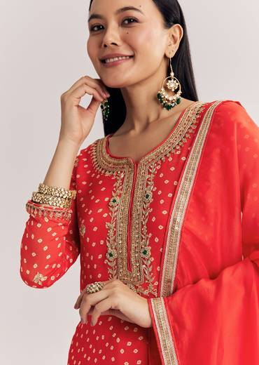 Bright Orange Bandhani Kurta Palazzo Suit With Sequins And Zardosi Work