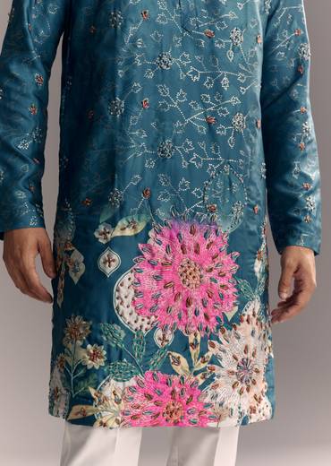 Festive Couple Set – Pink Embellished Cape Palazzo Set for Her And Blue Silk Kurta Set with Resham Embroidery for Him