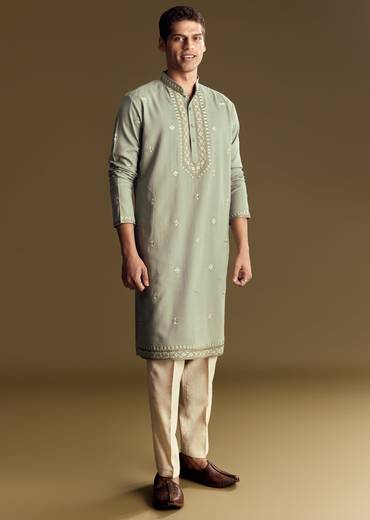 Emerald Green Celebration Pair – Zardozi Palazzo Suit For Her And Pastel Green Embroidered Linen Kurta Set For Him