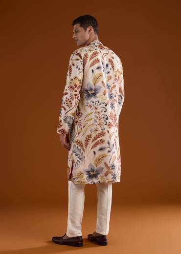 Heritage Maroon Elegance Couple Set – Maroon Printed Zari Kurta Set with Pant and Dupatta for Her And Cream Embroidered Rawsilk Kurta Set for Him