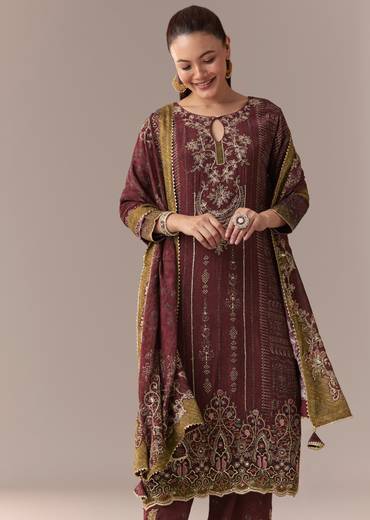 Heritage Maroon Elegance Couple Set – Maroon Printed Zari Kurta Set with Pant and Dupatta for Her And Cream Embroidered Rawsilk Kurta Set for Him