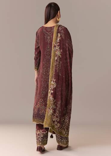 Heritage Maroon Elegance Couple Set – Maroon Printed Zari Kurta Set with Pant and Dupatta for Her And Cream Embroidered Rawsilk Kurta Set for Him