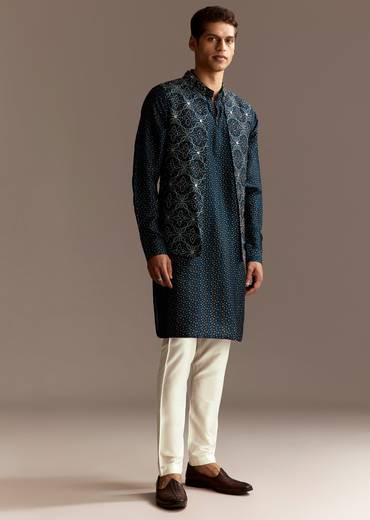 Artisan Couple Set – Indigo Modal Bridesmaid Lehenga With Ajrakh Print For Her And Blue Mirror Work Jacket Set For Him