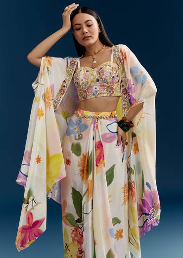 Floral Festive Couple Set – Cream Crop Top Skirt Set With Embroidered Cape For Her And Off-White Palazzo Kurta Set For Him
