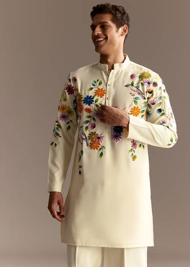 Floral Festive Couple Set – Cream Crop Top Skirt Set With Embroidered Cape For Her And Off-White Palazzo Kurta Set For Him