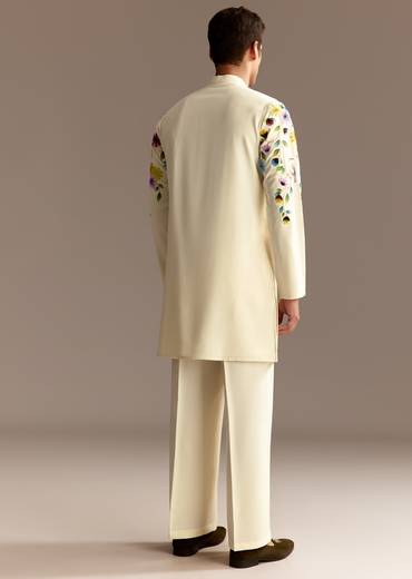 Floral Festive Couple Set – Cream Crop Top Skirt Set With Embroidered Cape For Her And Off-White Palazzo Kurta Set For Him