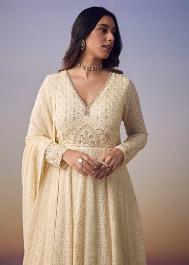 Ivory Heritage Duo – Lucknowi Anarkali Set For Her And Banarasi Silk Kurta Jacket Set For Him