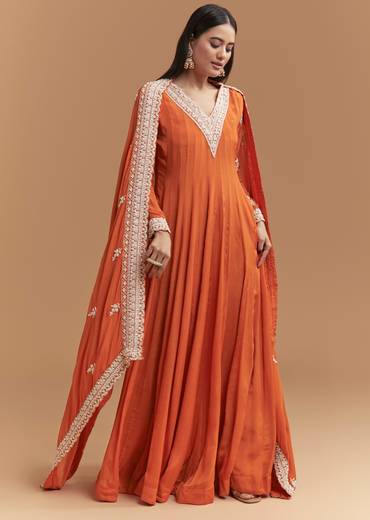 Vibrant Celebration Couple Set – Orange Chinon Hand-Embroidered Anarkali for Her And Orange Silk Kurta Jacket Set with Zardosi Work for Him