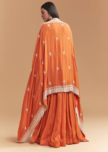 Vibrant Celebration Couple Set – Orange Chinon Hand-Embroidered Anarkali for Her And Orange Silk Kurta Jacket Set with Zardosi Work for Him