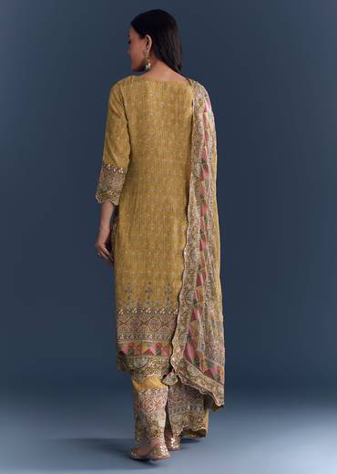 Mustard Ajrakh Cultural Pair – Indie Print Zari Kurta Set For Her And Yellow Linen Ajrakh Kurta Set For Him