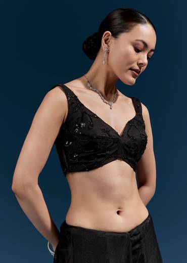 Bold Evening Couple Set – Black Heavy Embroidered Net Saree With Cutwork Border For Her And Black Embroidered Corduroy Shirt Jacket For Him