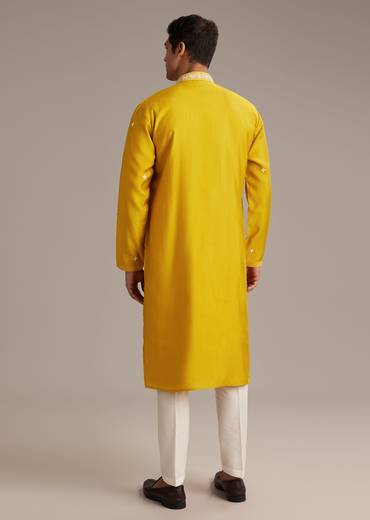 Mustard Yellow Coordinated Attire – Embellished Sharara Suit For Her And Yellow Silk Mirror Work Kurta Set For Him