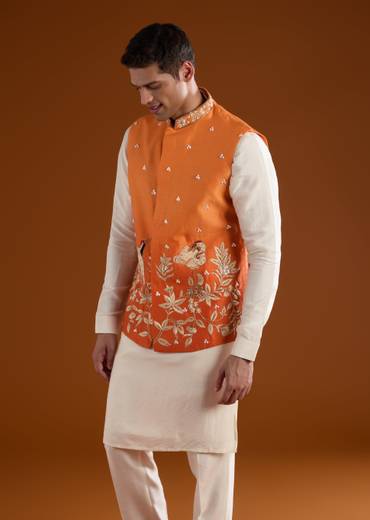 Vibrant Celebration Couple Set – Orange Chinon Hand-Embroidered Anarkali for Her And Orange Silk Kurta Jacket Set with Zardosi Work for Him