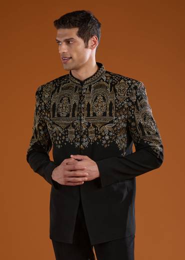 Bold Festive Couple Set – Black Silk Palazzo Suit With Zari Thread And Sequins Work For Her And Black Suiting Jodhpuri Pant Set With Embroidery For Him