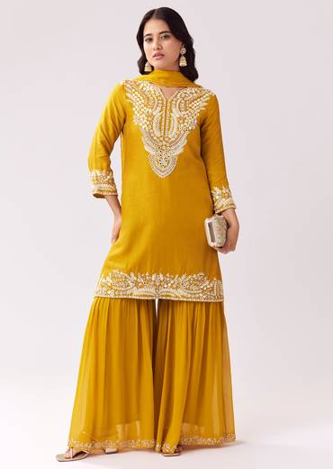 Bright Yellow Festive Duo – Mirror Work Sharara Set For Her And Mustard Viscose Kurta Set For Him