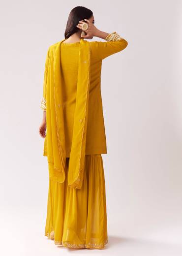 Bright Yellow Festive Duo – Mirror Work Sharara Set For Her And Mustard Viscose Kurta Set For Him