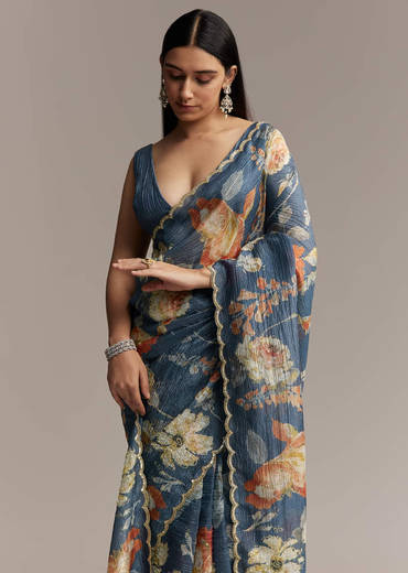 Teal Blue Tissue Saree With Floral Print And Embroidered Border