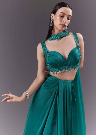 Teal Satin Crop Top And Drape Skirt Set With Heavy Embroidery