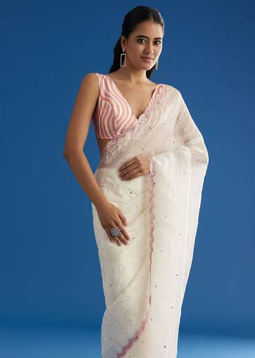 White Crepe Silk Saree With Mirror Scallop Border And Pink Contrast Blouse
