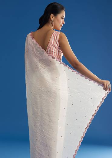 White Crepe Silk Saree With Mirror Scallop Border And Pink Contrast Blouse