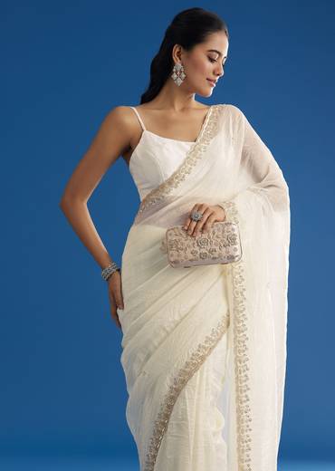 White Crushed Tissue Saree With Stones And Sequins Embroidery And Scallop Border