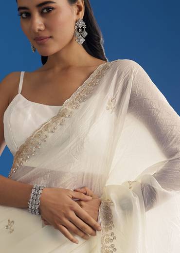 White Crushed Tissue Saree With Stones And Sequins Embroidery And Scallop Border