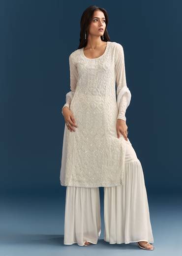 White Pakistani Sharara Suit With Sequin Details And Dupatta