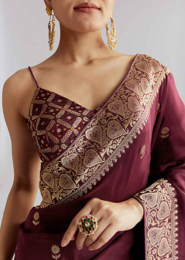Wine Silk Woven Saree With Floral Motif Work