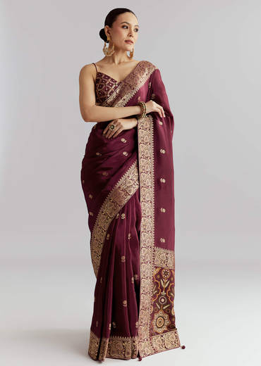 Wine Silk Woven Saree With Floral Motif Work