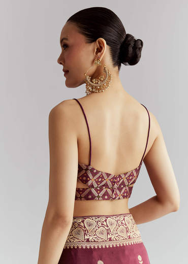 Wine Silk Woven Saree With Floral Motif Work