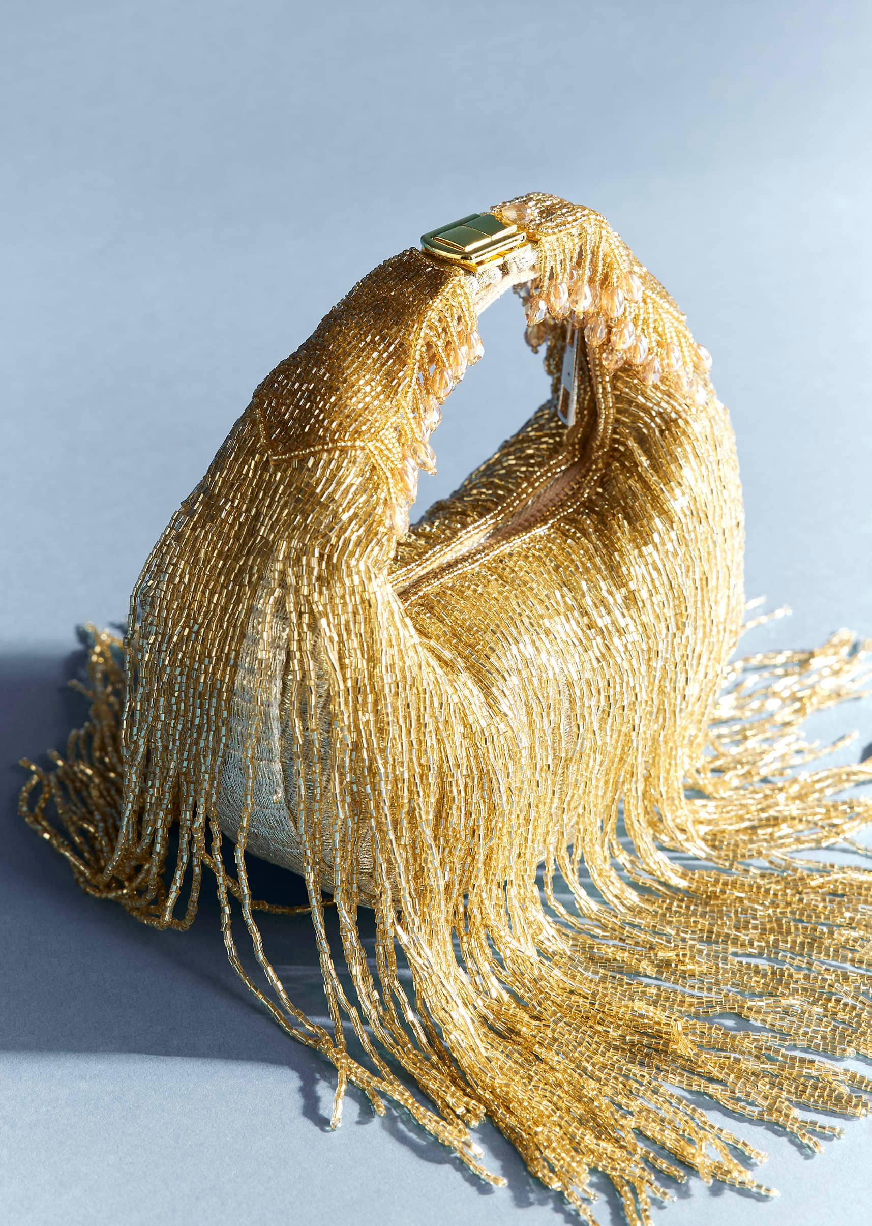 gold potli with tassel-sg329670-1-nosto 2