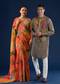 Fusion Couple Set – Orange Abstract Crush Saree for Her & Grey Handpainted Kalamkari Kurta Set for Him