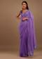 Light Purple Georgette Saree With Swarovski Stonework On The Borders And A Stonework Added Unstitched Blouse