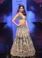 Palace Green Lehenga Choli In Velvet With Multi Colored Hand Embroidered Heritage Kalis With Hints Of Flowers