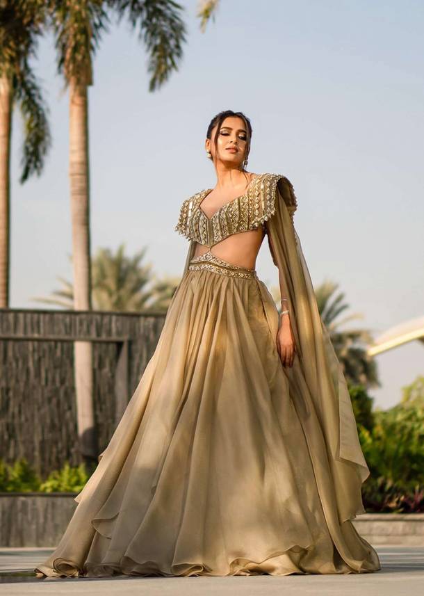 kalki champagne gold akasia gown with tassel wing-sg127268 1