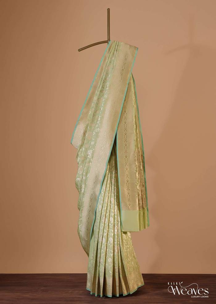 Green Handloom Banarasi Saree In Uppada Silk With Floral Jaal Weave And Unstitched Blouse