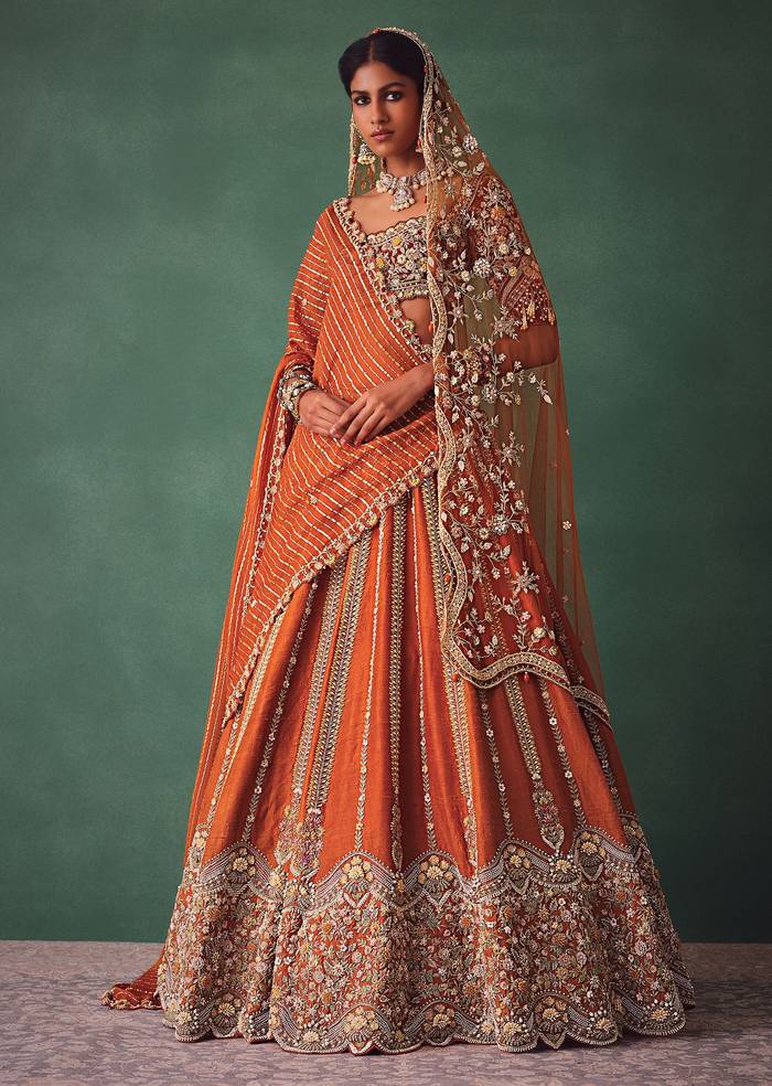 Rust Raw Silk Bridal Lehenga With Buti Work Dupatta