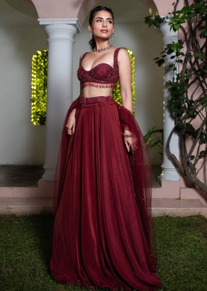 Maroon Embroidered Blouse And Lehenga With Net Dupatta