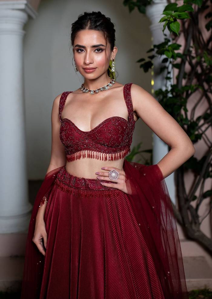 Maroon Embroidered Blouse And Lehenga With Net Dupatta