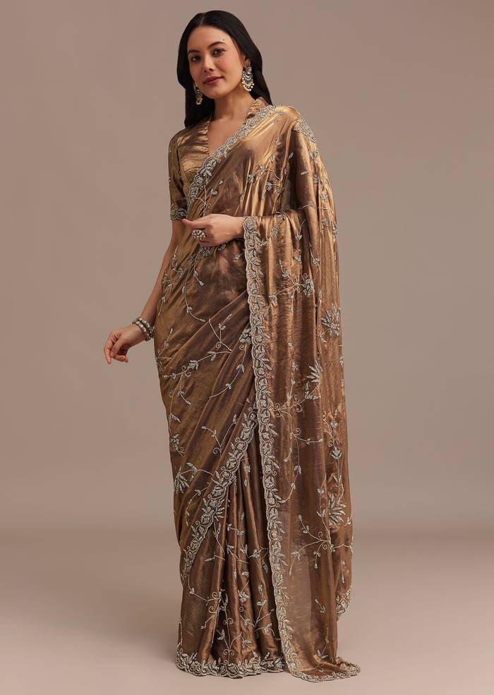 Dark Golden Beige Tissue Silk Saree With All Over Stone Embellishments