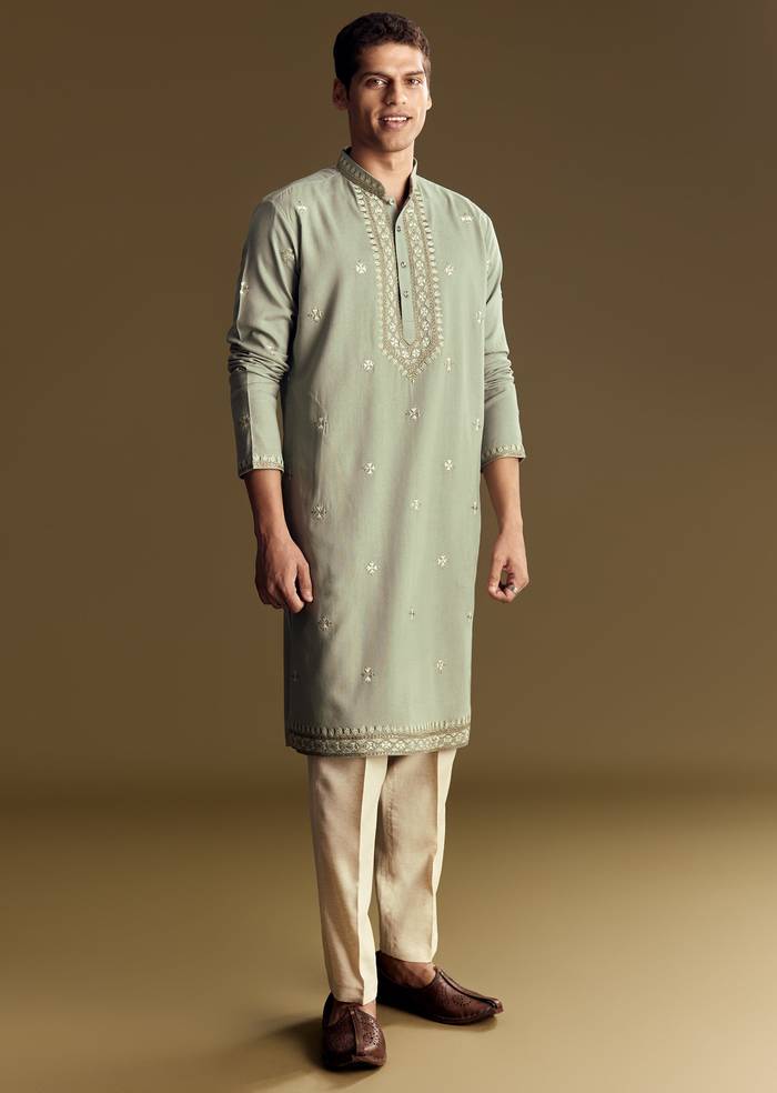 Emerald Green Celebration Pair – Zardozi Palazzo Suit For Her And Pastel Green Embroidered Linen Kurta Set For Him
