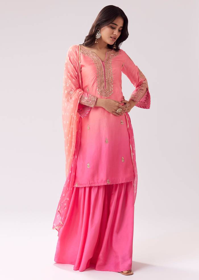 Blush Pink Twinning Ensemble – Gotta Work Sharara With Bandhani Dupatta For Her And Pink Silk Mandarin Collar Kurta For Him